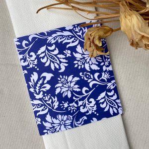 Servilleta de papel Blanca con porta servilletas Fondo Azul